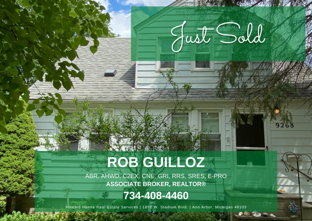 Picture of a house with "Just Sold" banner across the top and agent contact information at the bottom.